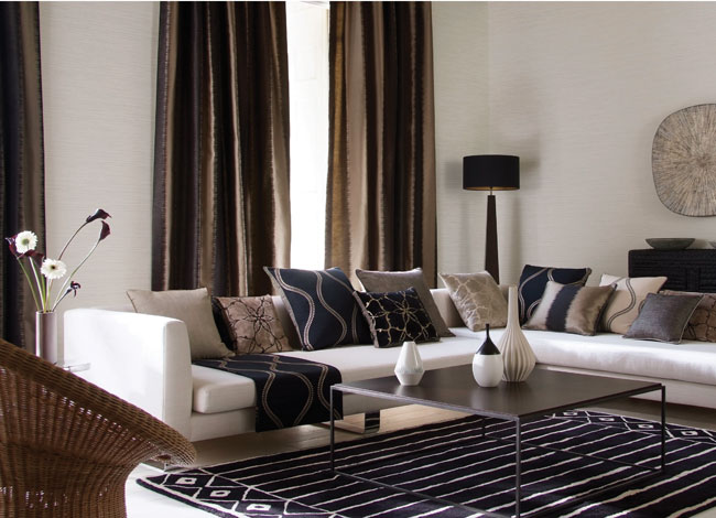 Salón con dobles cortinas - Villalba Interiorismo