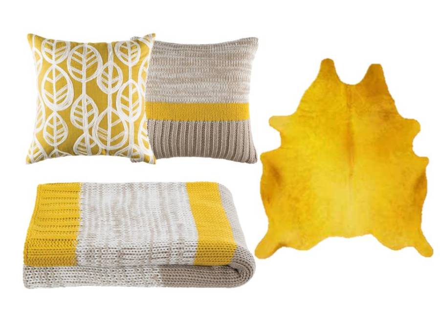 Manta, cojines y alfombra en amarillo - Villalba Interiorismo